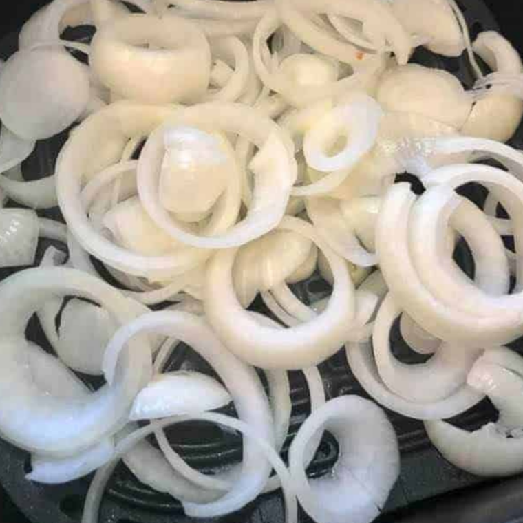 Rehydrating dried minced onion in warm water for McDonald’s style burger flavor boost