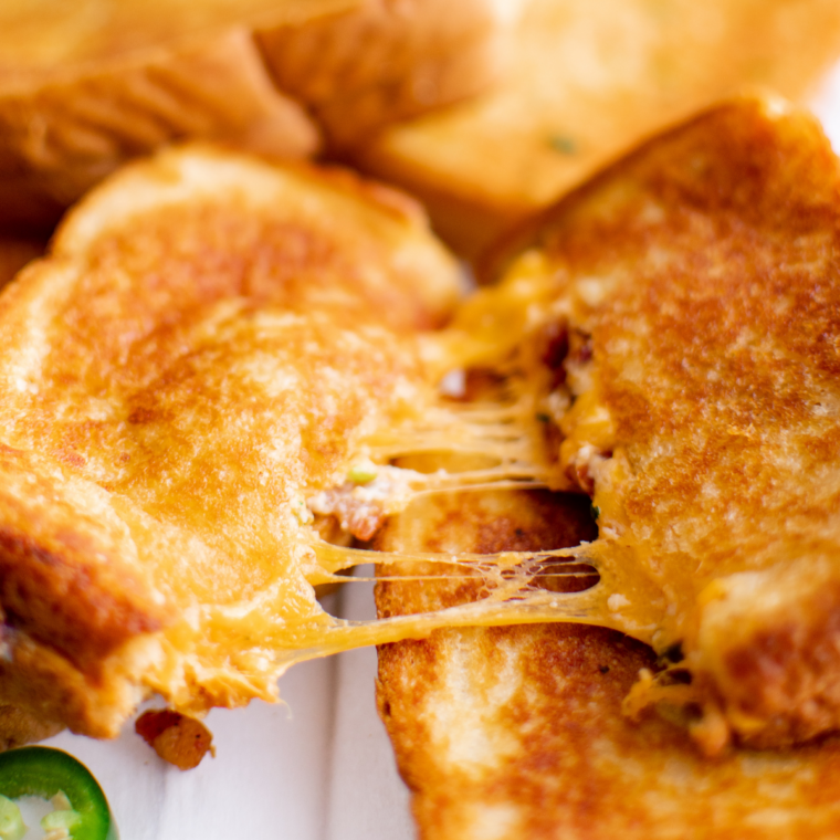 Homemade cheese toastie cooking inside a Ninja Crispi air fryer