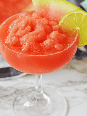 Beat the heat with a Ninja Slushi Watermelon Daiquiri! This refreshing frozen cocktail blends juicy watermelon, white rum, and lime for the ultimate summer slushie made right in your Ninja Slushi machine.