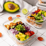 Easy air fryer shrimp taco bowls with juicy honey-lime shrimp, mango, slaw, and cilantro crema. Ready in 25 minutes and perfect for meal prep.