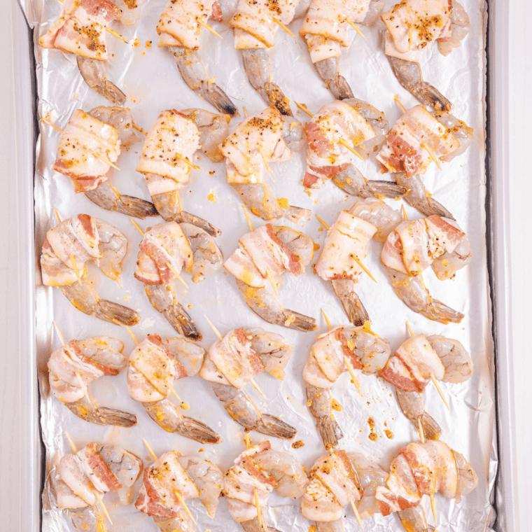 Tucking a thin slice of fresh jalapeño into a cream cheese stuffed shrimp