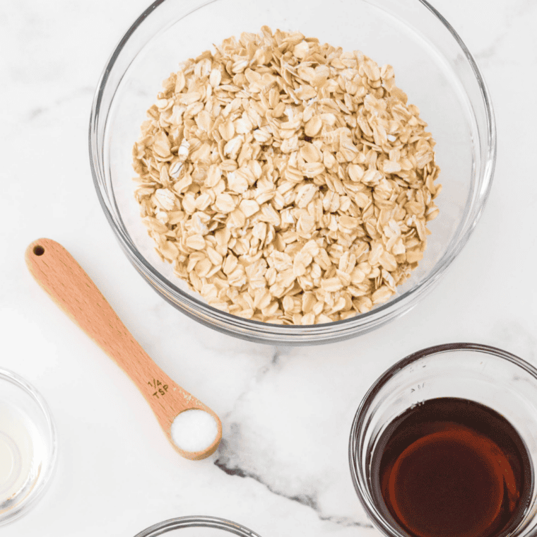 Ingredients for copycat Bear Naked Maple Pecan Crumble granola laid out in bowls