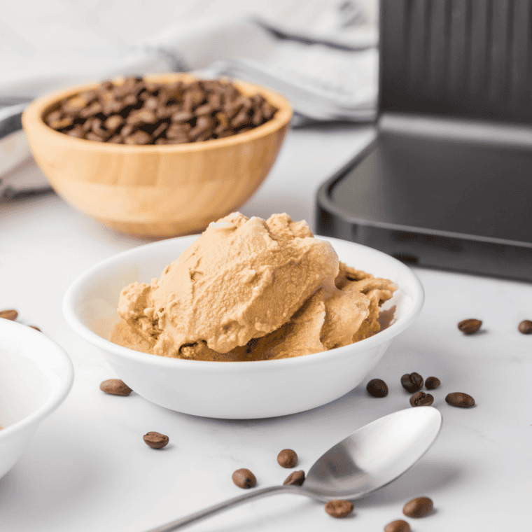 Scoop of Ninja Creami coffee ice cream in a glass bowl, a Cold Stone copycat recipe