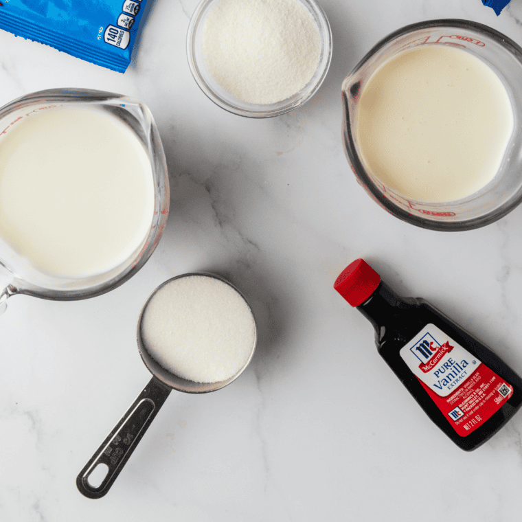 Ingredients for copycat Cold Stone cotton candy ice cream arranged on a table