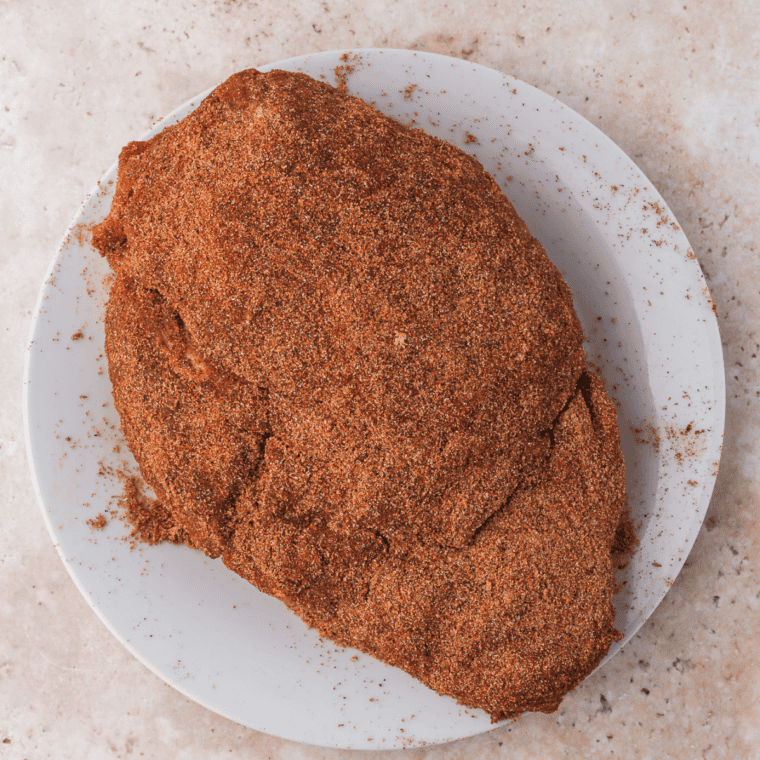 Pork shoulder generously rubbed with homemade brown sugar BBQ rub