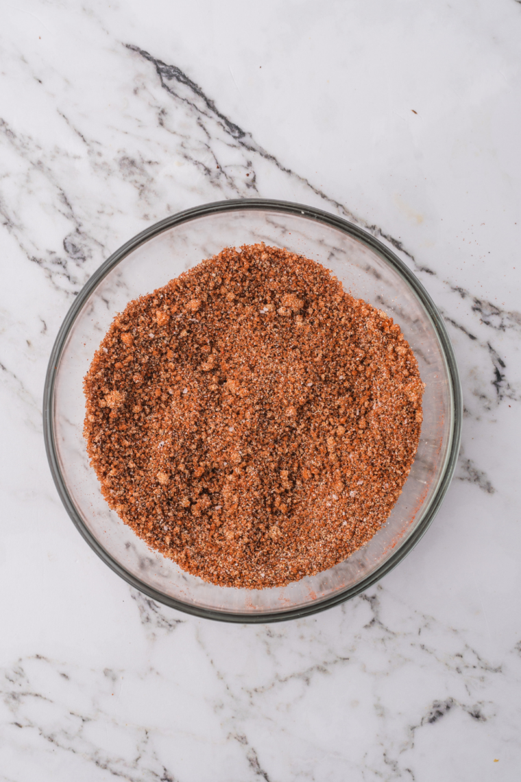 Whisking copycat McCormick Smokehouse Maple seasoning into a uniform smoky-red blend