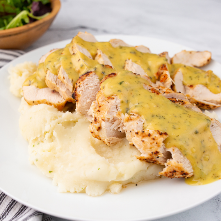 Bowl of creamy Copycat McDonald’s Honey Mustard dipping sauce with a smooth golden texture