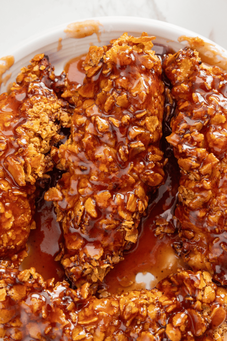 Chicken tenders glazed with homemade hickory bourbon BBQ sauce