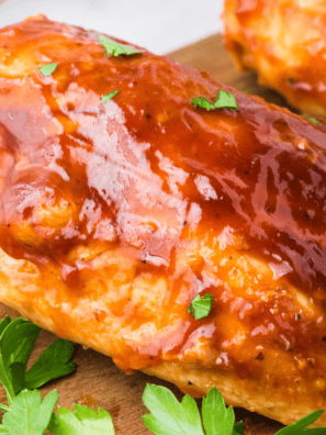 Jack Daniel's chicken breast glazed in sticky whiskey sauce, served over white rice with a sprinkle of green onions