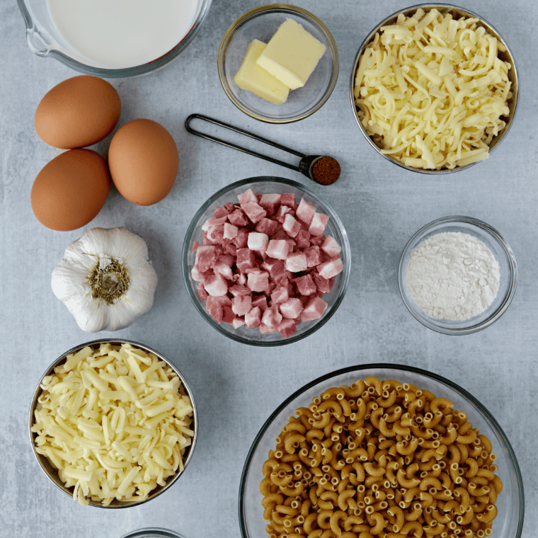 Ingredients for Jack Daniel's mac and cheese: macaroni, cheddar, gouda, bacon, milk, butter, and whiskey
