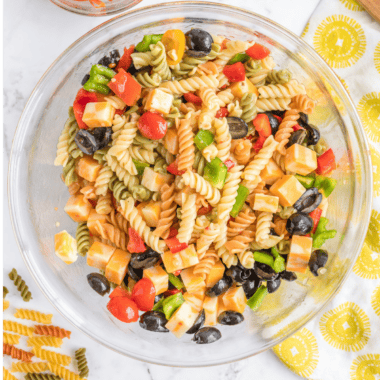 mccormick salad supreme recipe pasta salad in serving bowl with fresh vegetables"