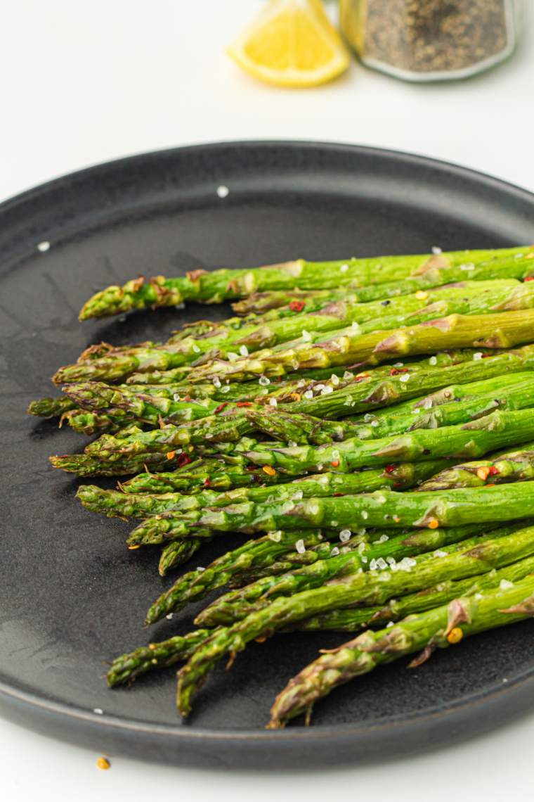 Air fried asparagus in Ninja Crispi with light seasoning and crispy edges