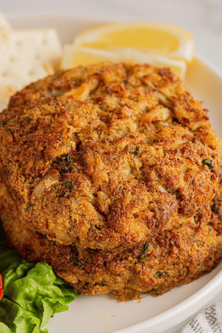Golden pan-seared jumbo lump crab cakes drizzled with lemon-garlic butter.