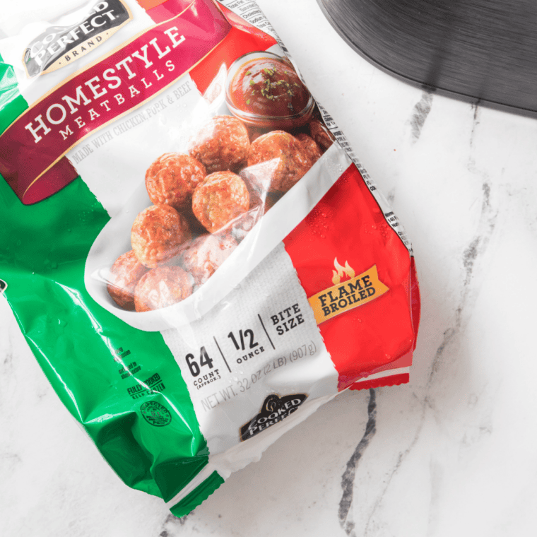 Bag of frozen meatballs on a table for crockpot Jack Daniel's meatballs