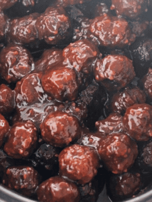 Crockpot Jack Daniel's meatballs cooked in sticky whiskey BBQ sauce in the slow cooker
