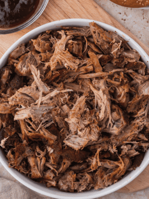 Bowl of homemade Cuban shredded pork seasoned with sazón completa complete seasoning