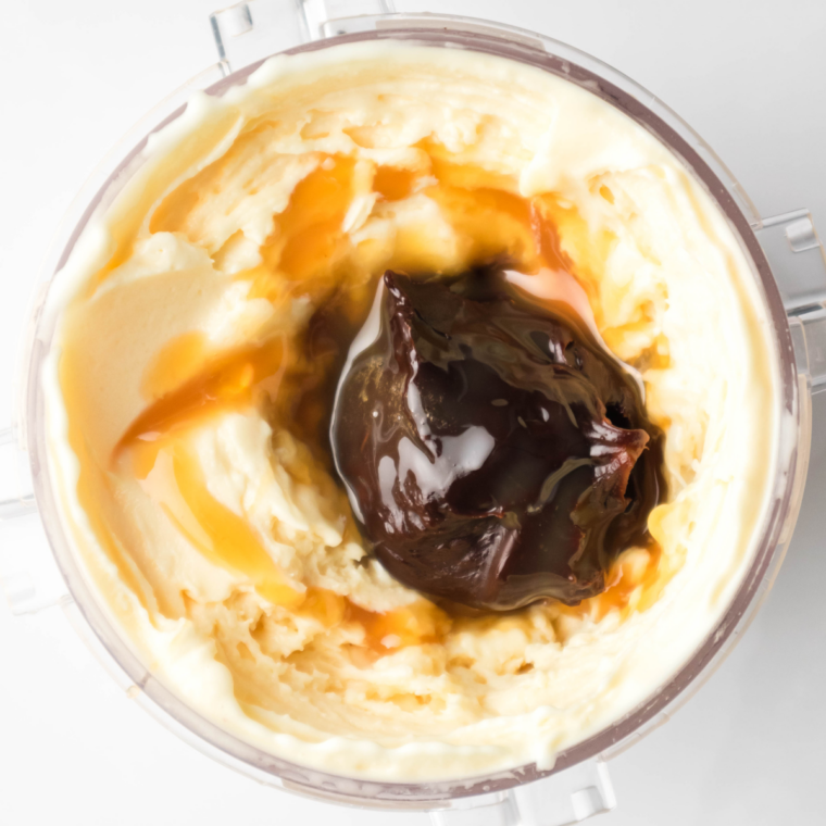 Chocolate cake pieces and dark fudge sauce added to the well before the Mix-In cycle.