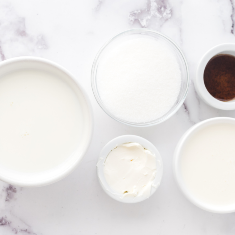 Ingredients for Blue Bell Sweet Cream Ninja Creami recipe: heavy cream, whole milk, sugar, vanilla, and cream cheese