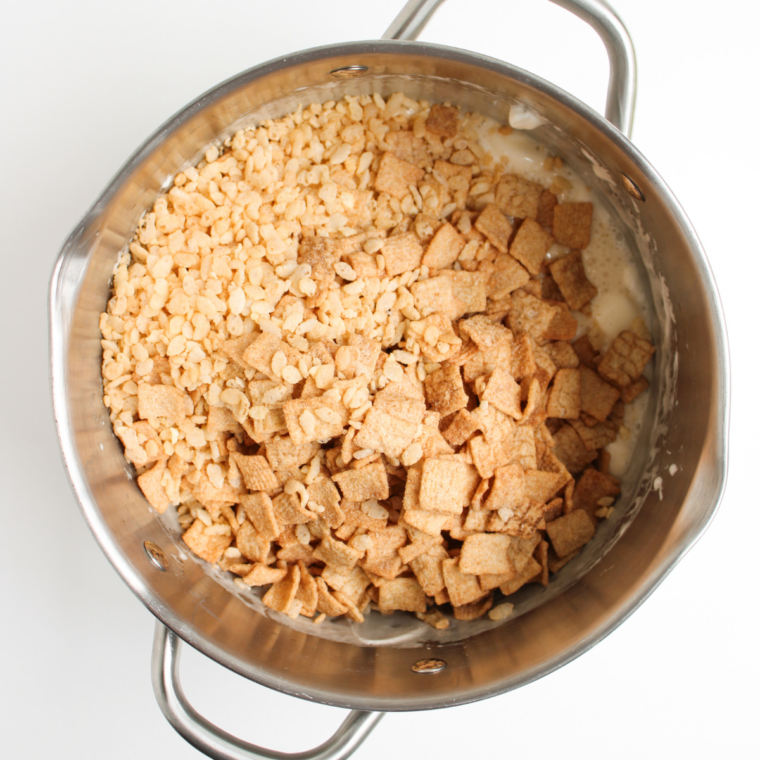 Rice Krispies and Cinnamon Toast Crunch cereal folded into melted marshmallow