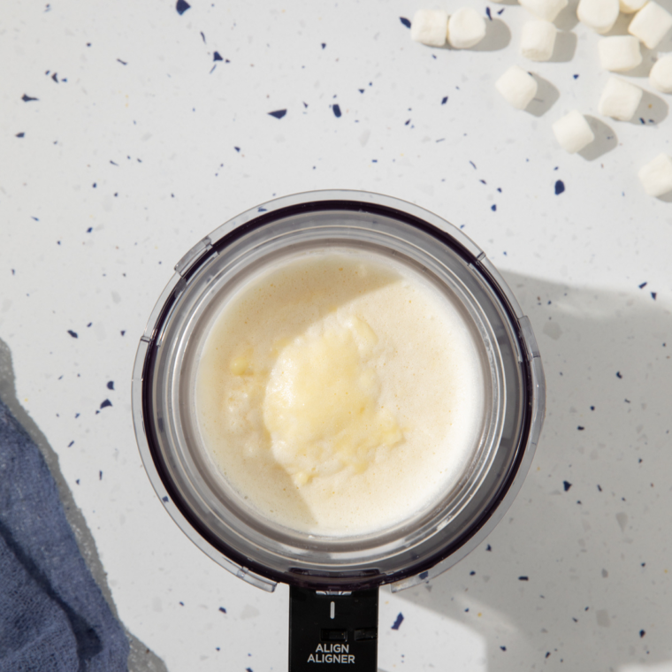 Processing frozen cake batter base in the Ninja Creami on the Lite Ice Cream cycle