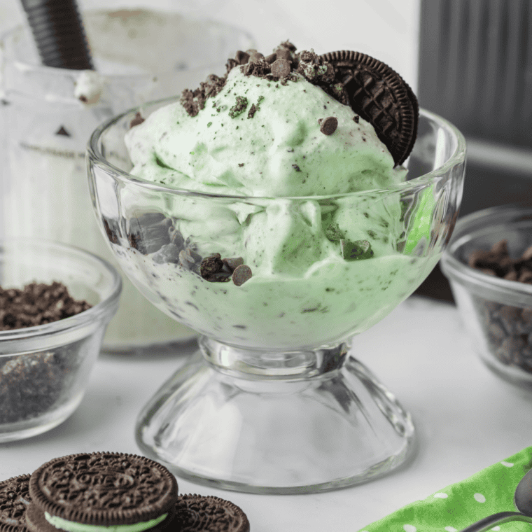 Smooth creamy green mint ice cream in a Ninja Creami pint after the re-spin function