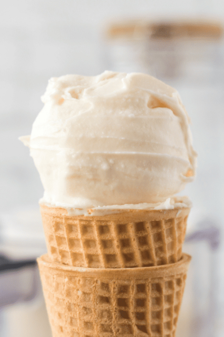Cold Stone Sweet Cream Ice Cream copycat in a waffle cone, dense and pale with a smooth scooped top