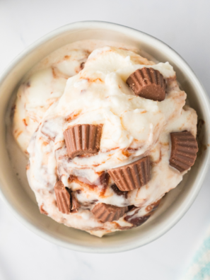 Cold Stone Sweet Cream Ice Cream copycat made in the Ninja Creami, scooped into a bowl with a soft vanilla-flecked texture