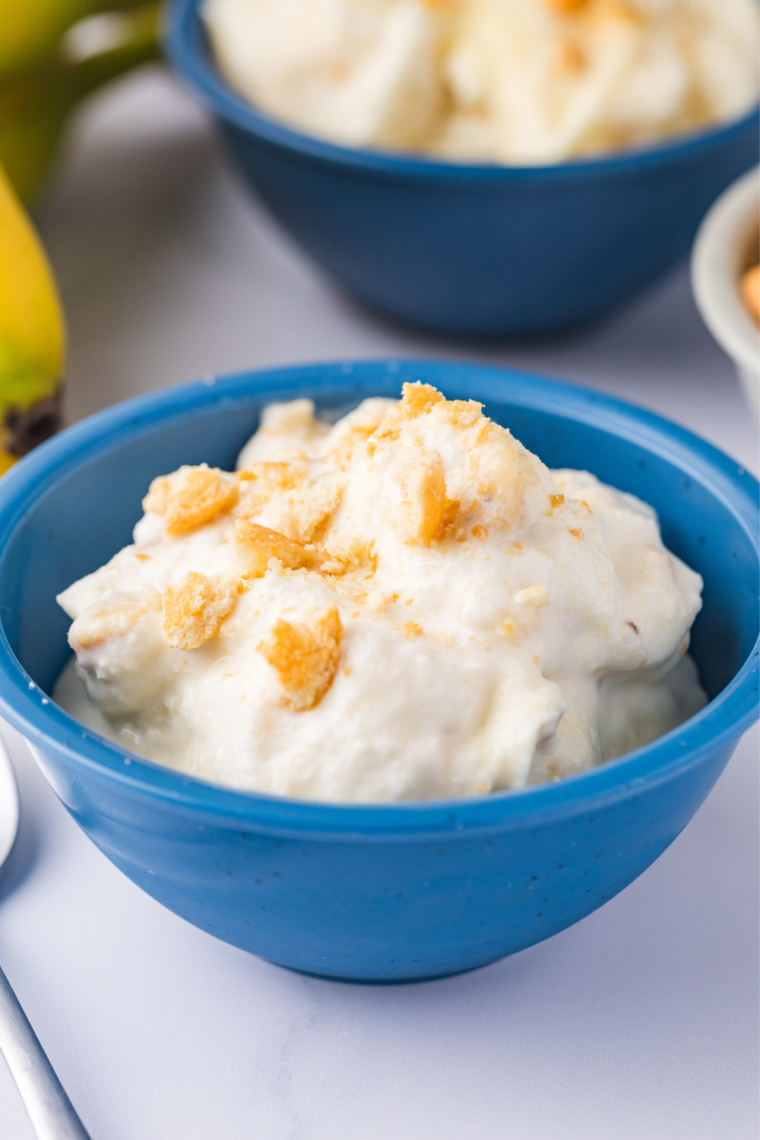Copycat Blue Bell banana pudding ice cream spun smooth in a Ninja Creami pint container