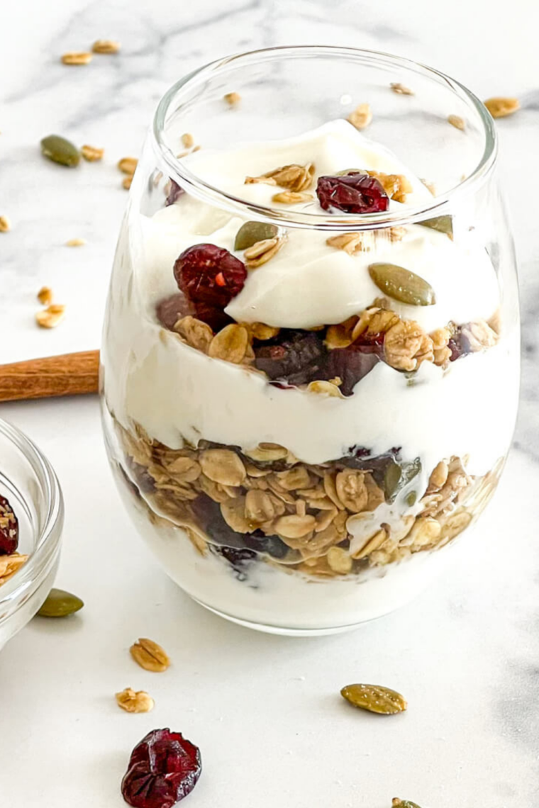 Copycat Culver's frozen custard topped with granola in a glass bowl