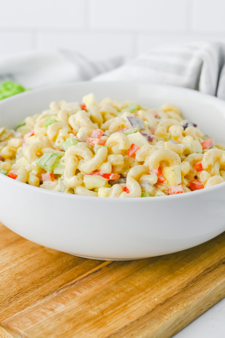 Overhead view of high protein cottage cheese pasta salad with elbow macaroni and cheddar cubes
