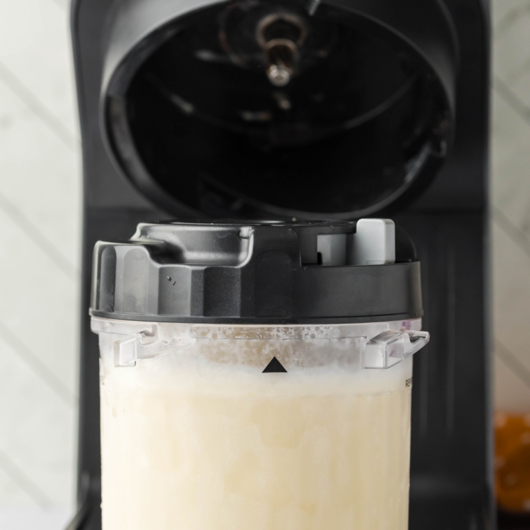 Spinning the protein base on the Ninja Creami Lite Ice Cream setting into soft-serve texture