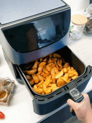 Basket-style air fryer on a kitchen counter ready to cook — clean, generic, works for most hero shots.