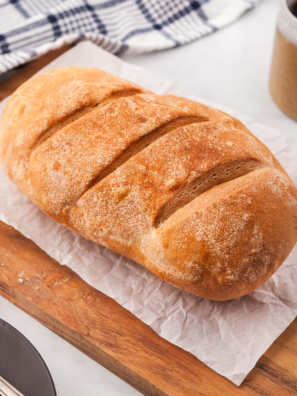 Longhorn Steakhouse bread recipe — two golden honey wheat loaves with grain topping in a bread basket
