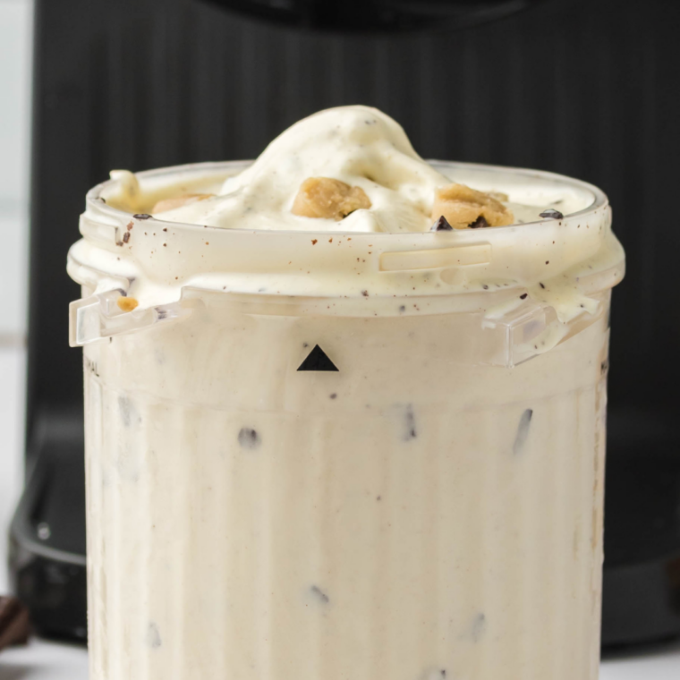 Ninja Creami chocolate chip cookie dough blizzard scooped into a bowl, ready to serve