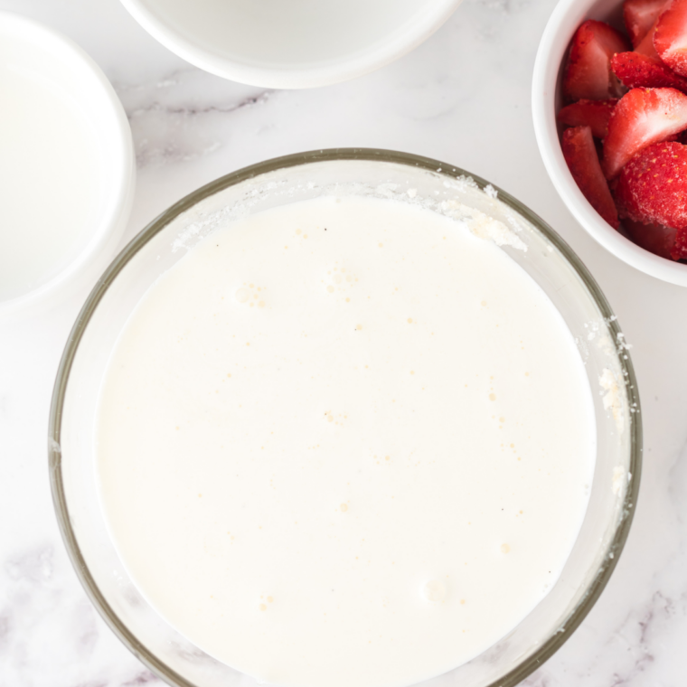 Strawberry purée whisked into the ice cream base, turning it soft Blue Bell pink