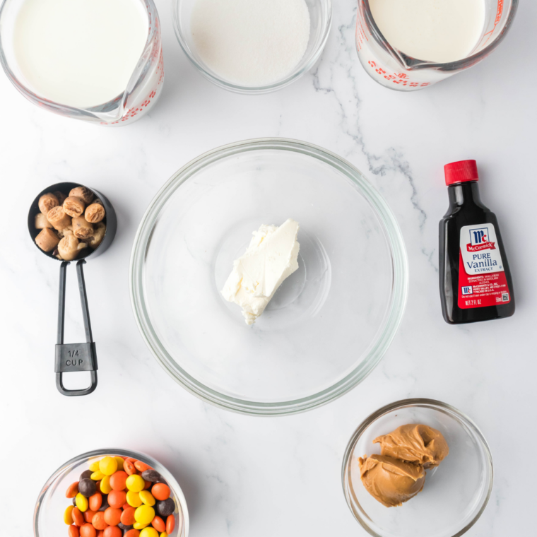 Ingredients for Ninja Creami Dairy Queen Reese's Blizzard laid out on a table