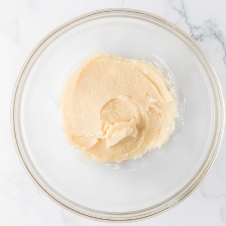 Whisking the Ninja Creami Reese's Blizzard base until smooth in a mixing bowl