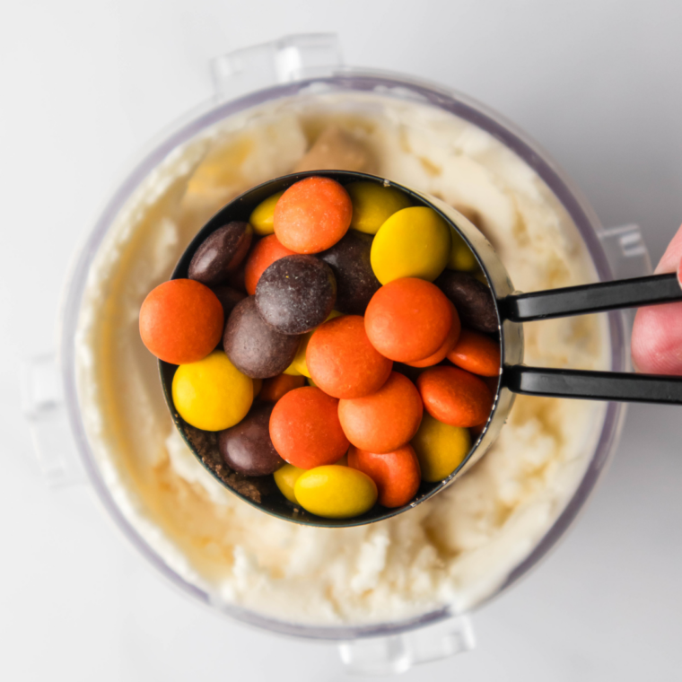 Adding chopped Reese's cups to the center of the Ninja Creami pint