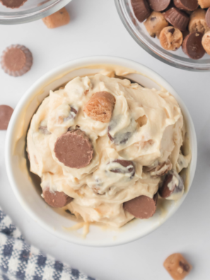 Ninja Creami Peanut Butter Cup Perfection ice cream scooped into a bowl with peanut butter cups on top