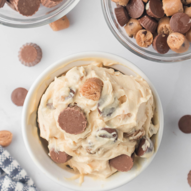 Close-up of velvety Ninja Creami peanut butter ice cream showing its rich, smooth, scoopable texture.