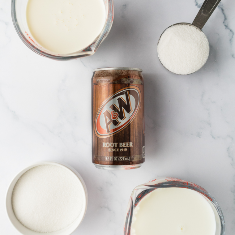 Ingredients for Ninja Creami root beer float Italian ice: root beer, sugar, heavy cream, and vanilla