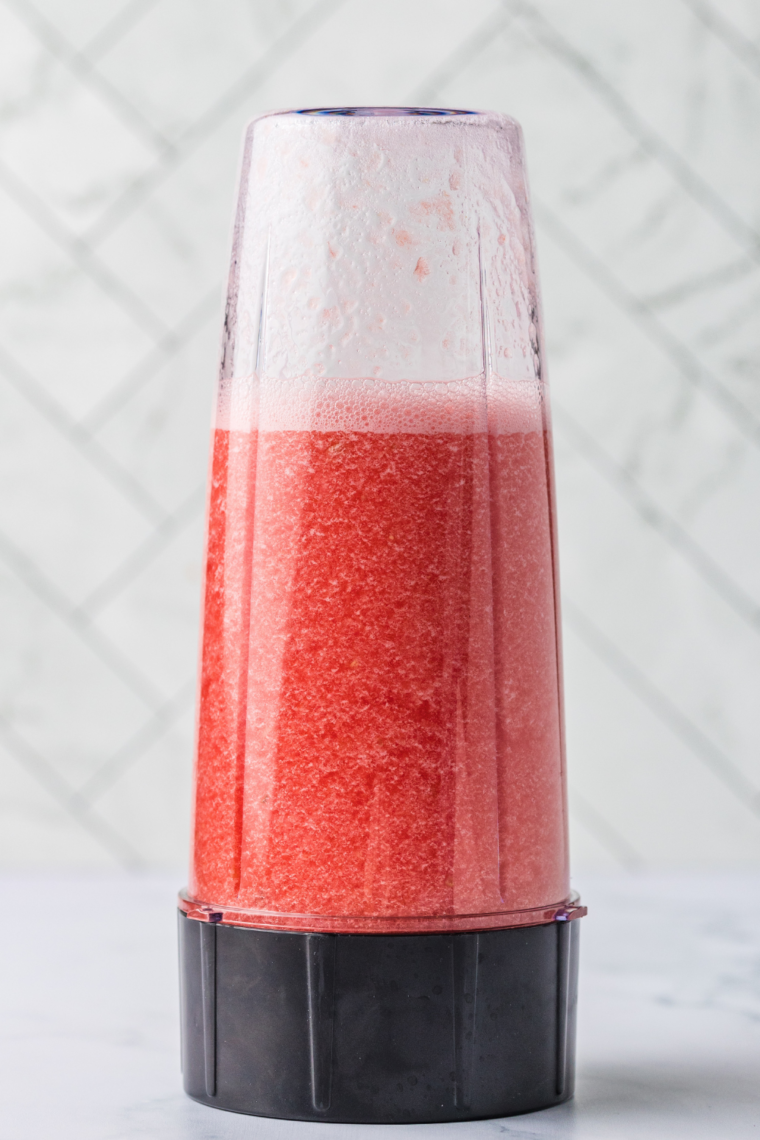 Watermelon chunks, sugar, water, and lime blended smooth for Ninja Creami watermelon Italian ice