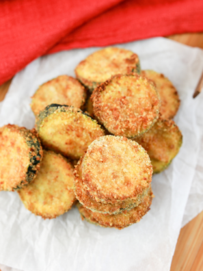 Ninja Crispi zucchini rounds with golden parmesan-panko crust on the crisper plate