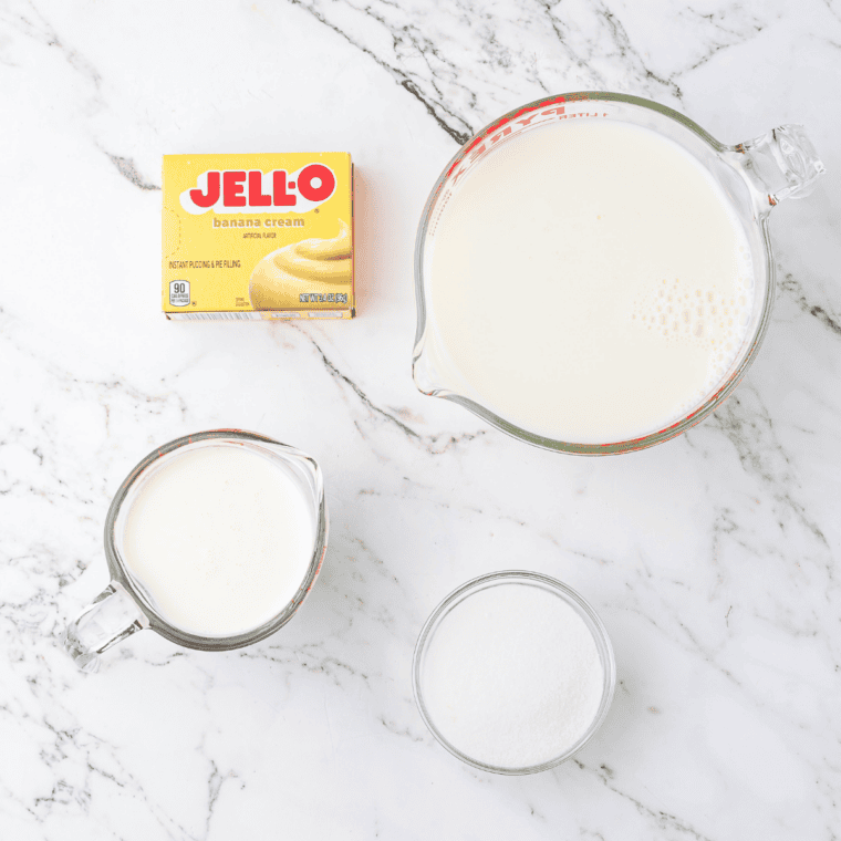 Ninja Slushi banana milkshake ingredients: milk, heavy cream, banana cream pudding, and sugar