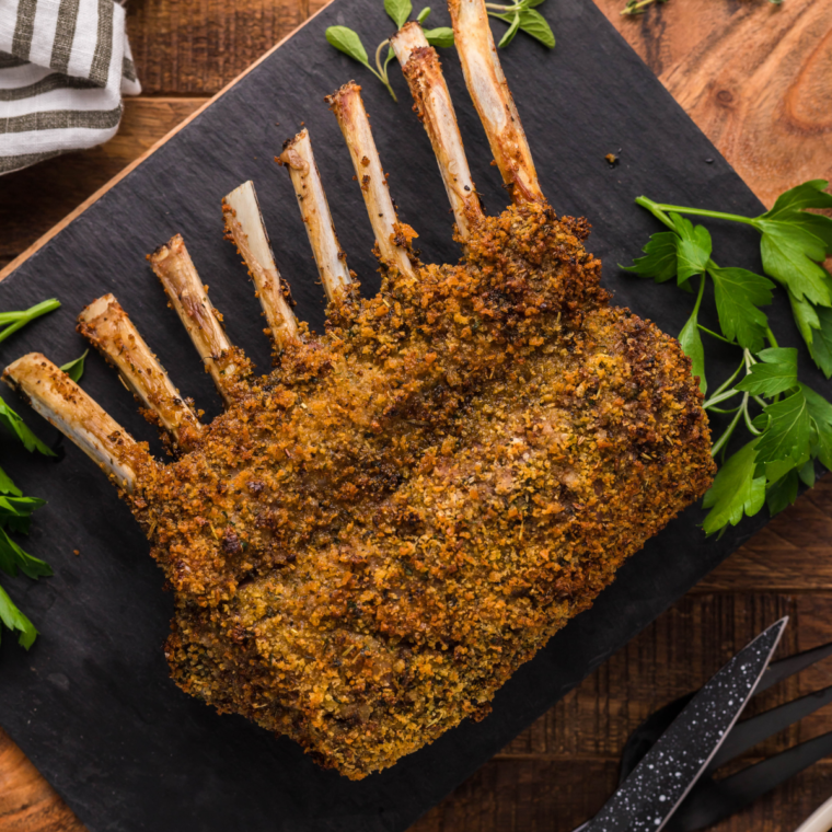 Parmesan crusted lamb chops baking until the panko crust turns golden and crackly