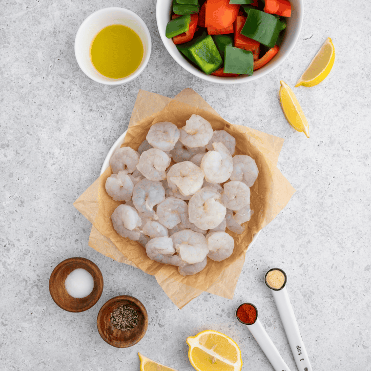 Ingredients for copycat Red Lobster Cajun seasoning — paprika, garlic powder, cayenne, and spices in bowls