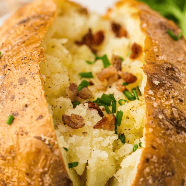 Loaded Ninja Crispi baked potato with butter, sour cream, cheddar, and chives