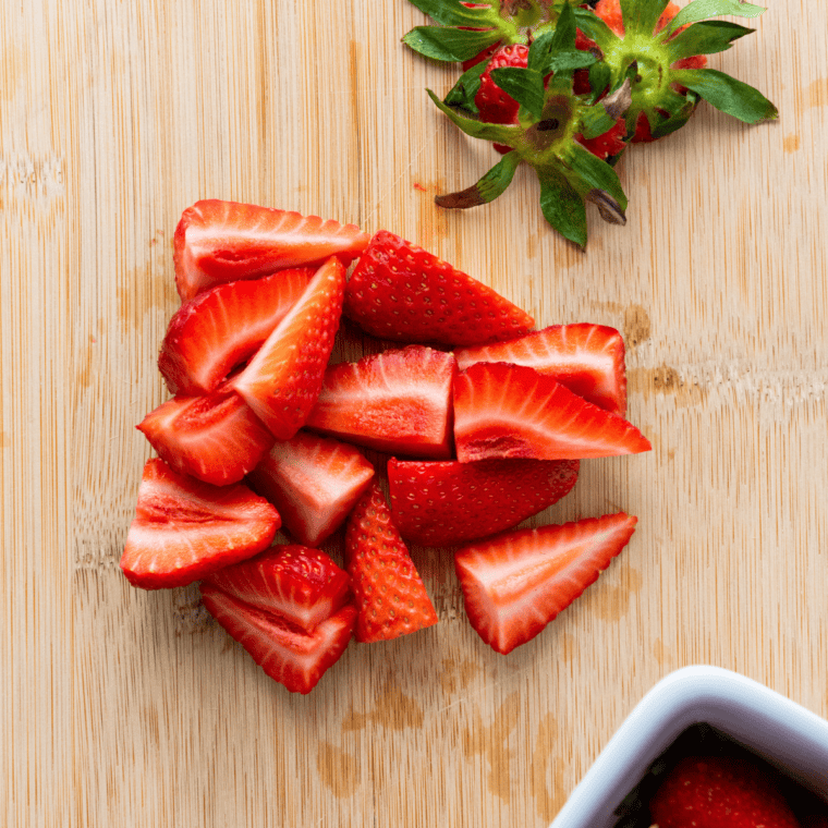 Strawberries macerating with sugar before being puréed for a Ninja Slushi milkshake