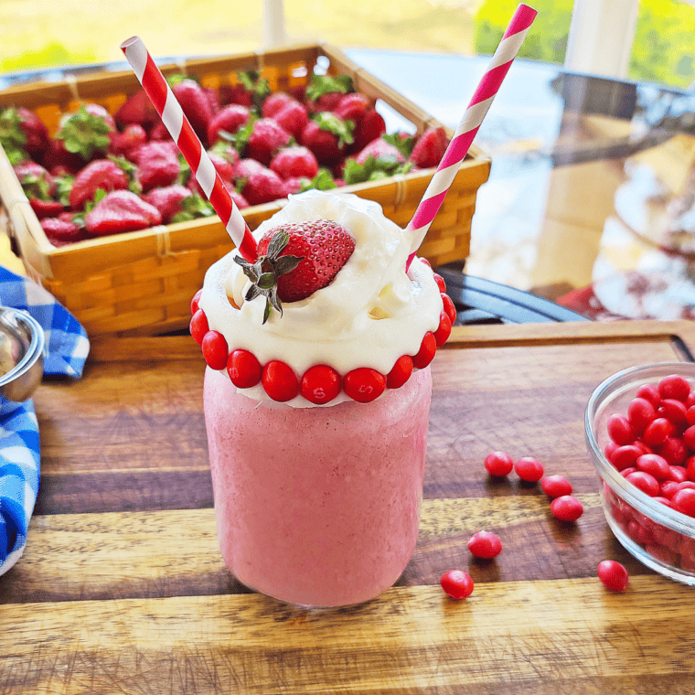 Thick homemade strawberry milkshake made in the Ninja Slushi, no ice cream needed